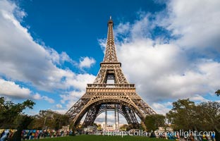 La Tour Eiffel, The Eiffel Tower is an iron lattice tower located on the Champ de Mars in Paris, named after the engineer Gustave Eiffel, who designed the tower in 1889 as the entrance arch to the 1889 World's Fair. The Eiffel tower is the tallest structure in Paris and the most-visited paid monument in the world