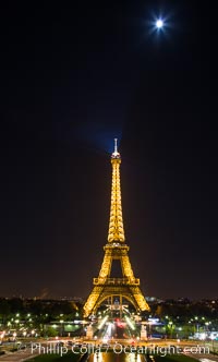 La Tour Eiffel. The Eiffel Tower is an iron lattice tower located on the Champ de Mars in Paris, named after the engineer Gustave Eiffel, who designed the tower in 1889 as the entrance arch to the 1889 World's Fair. The Eiffel tower is the tallest structure in Paris and the most-visited paid monument in the world