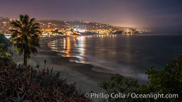 Laguna Beach coastline at night, lit by a full moon