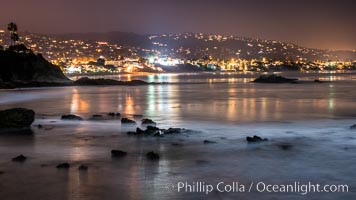 Laguna Beach coastline at night, lit by a full moon