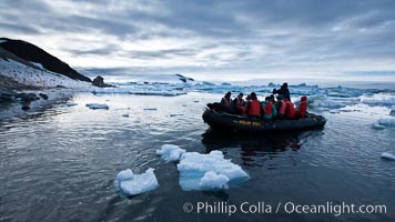 Landing ashore at Paulet Island, in an inflatable, at sunset.