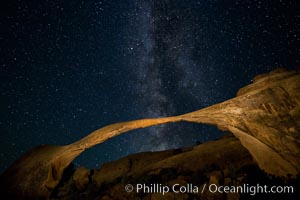 Landscape Arch and Milky Way, stars rise over the arch at night. (Note: this image was created before a ban on light-painting in Arches National Park was put into effect.  Light-painting is no longer permitted in Arches National Park)