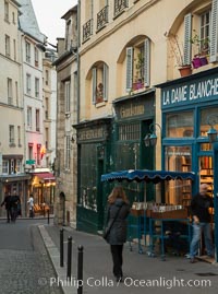 Latin Quarter.  The Latin Quarter of Paris is an area in the 5th and parts of the 6th arrondissement of Paris. It is situated on the left bank of the Seine, around the Sorbonne known for student life, lively atmosphere and bistros, Quartier Latin