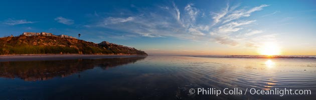 Leucadia wet sand beach and sea cliffs, sunset.