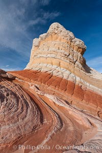 Brilliant red striations around the base of this pinnacle are responsible for its name: the Lollipop, White Pocket, Vermillion Cliffs National Monument, Arizona