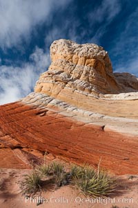 Brilliant red striations around the base of this pinnacle are responsible for its name: the Lollipop, White Pocket, Vermillion Cliffs National Monument, Arizona