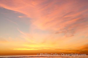 A lone lobster boat works its traps at sunset off the coast of Carlsbad, Ponto