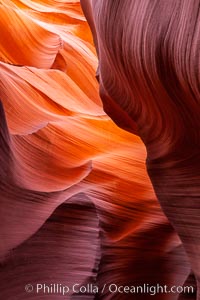 Image 26615, Lower Antelope Canyon, a deep, narrow and spectacular slot canyon lying on Navajo Tribal lands near Page, Arizona. Navajo Tribal Lands, USA, Phillip Colla, all rights reserved worldwide. Keywords: adventure, antelope canyon, arizona, canyon, desert, environment, erosion, explore, geologic features, geology, gulch, landscape, lower antelope canyon, narrow, nature, navaho, navajo tribal lands, outdoors, outside, page, ravine, sandstone, scene, scenery, scenic, slot, slot canyon, trail, tribal, usa.