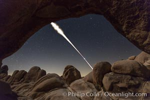 Lunar Eclipse Sequence, the path of the moon through the sky as it progresses from being fully visible (top) to fully eclipsed (middle) to almost fully visible again (bottom), viewed through Arch Rock, April 4 2015