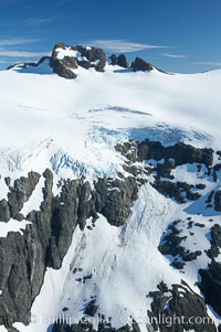 Glaciers on the summit of Mariner Mountain, on the west coast of Vancouver Island, British Columbia, Canada, part of Strathcona Provincial Park, located 36 km (22 mi) north of Tofino.  It is 1,771 m (5,810 ft) high and is snow covered year-round