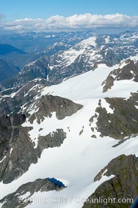 Mariner Mountain, on the west coast of Vancouver Island, British Columbia, Canada, part of Strathcona Provincial Park, located 36 km (22 mi) north of Tofino.  It is 1,771 m (5,810 ft) high, snow covered year-round and home to several glaciers