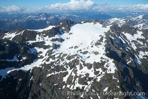 Mariner Mountain, on the west coast of Vancouver Island, British Columbia, Canada, part of Strathcona Provincial Park, located 36 km (22 mi) north of Tofino.  It is 1,771 m (5,810 ft) high, snow covered year-round and home to several glaciers