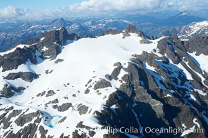 Glaciers on the summit of Mariner Mountain, on the west coast of Vancouver Island, British Columbia, Canada, part of Strathcona Provincial Park, located 36 km (22 mi) north of Tofino.  It is 1,771 m (5,810 ft) high and is snow covered year-round