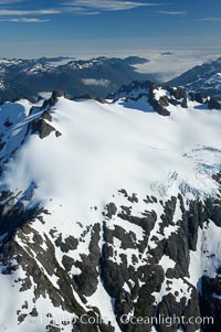 Glaciers on the summit of Mariner Mountain, on the west coast of Vancouver Island, British Columbia, Canada, part of Strathcona Provincial Park, located 36 km (22 mi) north of Tofino.  It is 1,771 m (5,810 ft) high and is snow covered year-round