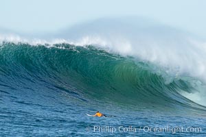 The wave.  Brock Little (third place) paddles out to the lineup, final round.  Mavericks surf contest, February 7, 2006, Half Moon Bay, California