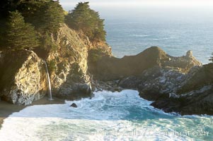 McWay Falls drops 80 feet on the sand in McWay Cove.  McWay Falls is fed by springs so falls year round, Julia Pfeiffer Burns State Park, Big Sur, California