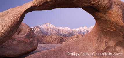 Mobius Arch at sunrise, framing snow dusted Lone Pine Peak and the Sierra Nevada Range in the background.  Also known as Galen's Arch, Mobius Arch is found in the Alabama Hills Recreational Area near Lone Pine