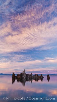 Tufa and clouds reflected in the still waters of Mono Lake.