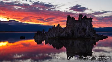 Mono Lake sunset, Sierra Nevada mountain range and tufas, clouds reflected in the still waters of Mono Lake