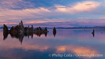 Mono Lake sunset, tufa and clouds reflected in the still waters of Mono Lake