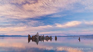 Mono Lake sunset, tufa and clouds reflected in the still waters of Mono Lake