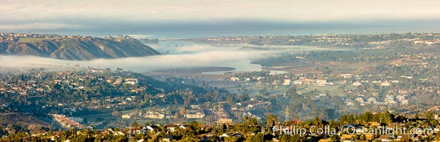 Morning fog over Batiquitos Lagoon, Carlsbad.  The Batiquitos Lagoon is a coastal wetland in southern Carlsbad, California. Part of the lagoon is designated as the Batiquitos Lagoon State Marine Conservation Area, run by the California Department of Fish and Game as a nature reserve