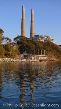 Moss Landing Power Plant rise above Moss Landing harbor and Elkhorn Slough.  The Moss Landing Power Plant is an electricity generation plant at Moss Landing, California.  The twin stacks, each 500 feet high, mark two generation units product 750 megawatts each