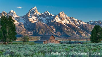 John Moulton barn at sunrise with Teton Range, on Mormon Row in Grand Teton National Park, Wyoming