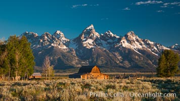 John Moulton barn at sunrise with Teton Range, on Mormon Row in Grand Teton National Park, Wyoming