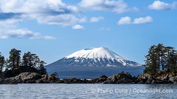 Mount Edgecumbe seen from the Sitka Sound. A volcano, Mount Edgecumbe has an elevation of 3201 feet and lies on the tip of Kruzof Island about 24 miles west of Sitka