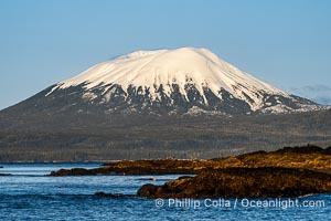 Mount Edgecumbe seen from the Sitka Sound. A volcano, Mount Edgecumbe has an elevation of 3201 feet and lies on the tip of Kruzof Island about 24 miles west of Sitka