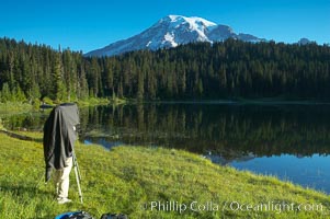 A photographer composes his image with a large view camera, Reflection Lake and Mount Rainier, Mount Rainier National Park, Washington
