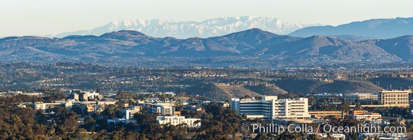 Snow-covered Mount San Gorgonio, seen beyond Double Peak Park in San Marcos, viewed from Mount Soledad in La Jolla, on an exceptionally clear winter day. Double Peak is about 20 miles away while the San Bernardino Mountains are about 90 miles distant. In the foreground are UCSD (University of California at San Diego, left), Veterans Administration Hospital (center) and Scripps La Jolla Medical Center (right)