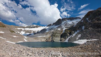 Nameless Lake, surrounded by glacier-sculpted granite peaks of the Cathedral Range, near Vogelsang High Sierra Camp, Yosemite National Park, California