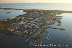 Naval Amphibious Base Coronado, situated on the Silver Strand between San Diego Bay and the Pacific Ocean, is the West Coast focal point for special and expeditionary warfare training and operations.  The famous "swastika building" is seen on the southern (left) side of the base