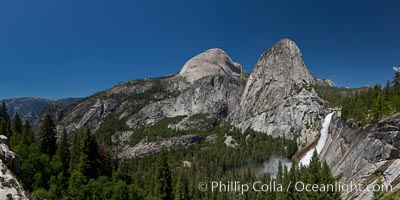 Half Dome and Nevada Falls, with Liberty Cap between them, viewed from the John Muir Trail / Panorama Trail.  Nevada Falls is in peak spring flow from heavy snowmelt in the high country above Yosemite Valley, Yosemite National Park, California