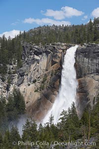 Nevada Falls marks where the Merced River plummets almost 600 through a joint in the Little Yosemite Valley, shooting out from a sheer granite cliff and then down to a boulder pile far below.