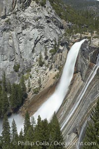 Nevada Falls marks where the Merced River plummets almost 600 through a joint in the Little Yosemite Valley, shooting out from a sheer granite cliff and then down to a boulder pile far below, Yosemite National Park, California