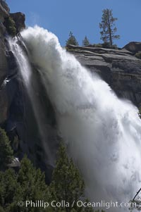 Nevada Falls marks where the Merced River plummets almost 600 through a joint in the Little Yosemite Valley, shooting out from a sheer granite cliff and then down to a boulder pile far below, Yosemite National Park, California