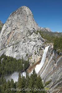 Nevada Falls, with Liberty Cap rising above it. Nevada Falls marks where the Merced River plummets almost 600 through a joint in the Little Yosemite Valley, shooting out from a sheer granite cliff and then down to a boulder pile far below, Yosemite National Park, California
