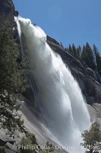 Nevada Falls marks where the Merced River plummets almost 600 through a joint in the Little Yosemite Valley, shooting out from a sheer granite cliff and then down to a boulder pile far below, Yosemite National Park, California