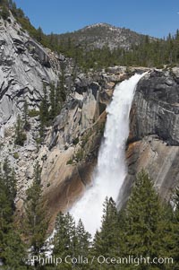 Nevada Falls marks where the Merced River plummets almost 600 through a joint in the Little Yosemite Valley, shooting out from a sheer granite cliff and then down to a boulder pile far below, Yosemite National Park, California