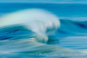 Breaking wave, fast motion and blur. The Wedge, Newport Beach, California.