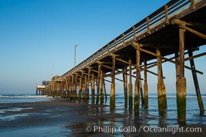 Newport Pier, underneath the pier, pilings and ocean, Newport Beach, California