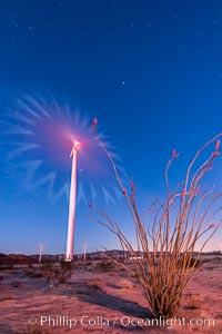 Ocotillo Express Wind Energy Projects, moving turbines lit by the rising sun,