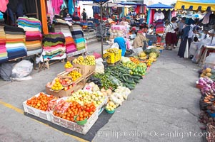 Otavalo market, a large and famous Andean market high in the Ecuadorian mountains, is crowded with locals and tourists each Saturday, San Pablo del Lago