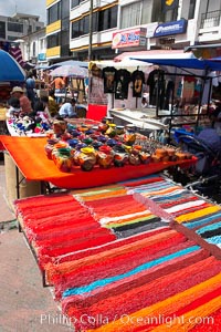 Otavalo market, a large and famous Andean market high in the Ecuadorian mountains, is crowded with locals and tourists each Saturday, San Pablo del Lago