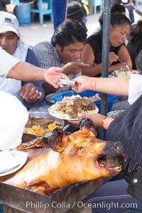 Otavalo market, a large and famous Andean market high in the Ecuadorian mountains, is crowded with locals and tourists each Saturday, San Pablo del Lago