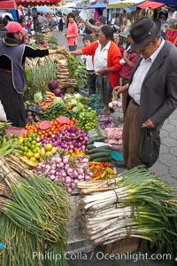 Otavalo market, a large and famous Andean market high in the Ecuadorian mountains, is crowded with locals and tourists each Saturday, San Pablo del Lago