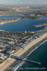 Pacific Beach, Crystal Pier and Mission Bay, looking south.  Downtown San Diego is seen in the distance.